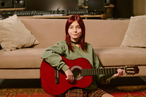 istock Teenage Girl with Guitar at Studio 2199116045