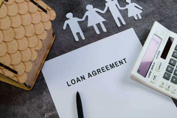 istock Family financial planning with loan agreement on table 2199116387
