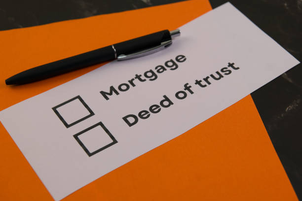 istock Mortgage and deed of trust checklist on table 2199116528