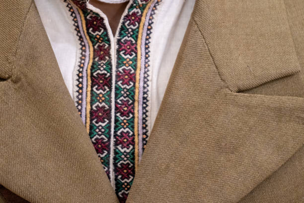 Ukrainian cross stitch. Vyshyvanka shirt. Embroidery Ukraine ornament threads background