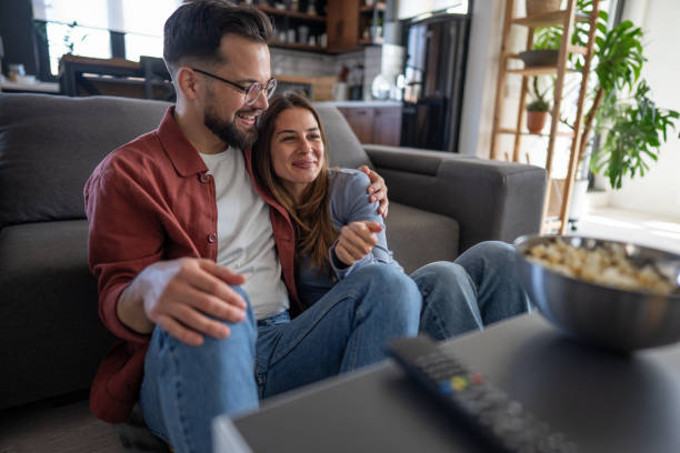 istock Young couple enjoying a movie 2199122446