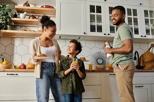 istock Joyful family moment in a bright kitchen with snacks and laughter 2199123754