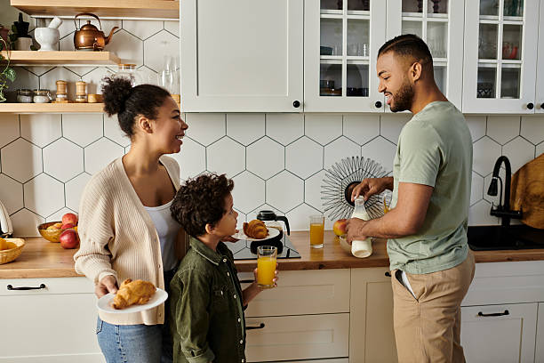 istock Joyful moments shared by a loving family during breakfast at home 2199123760