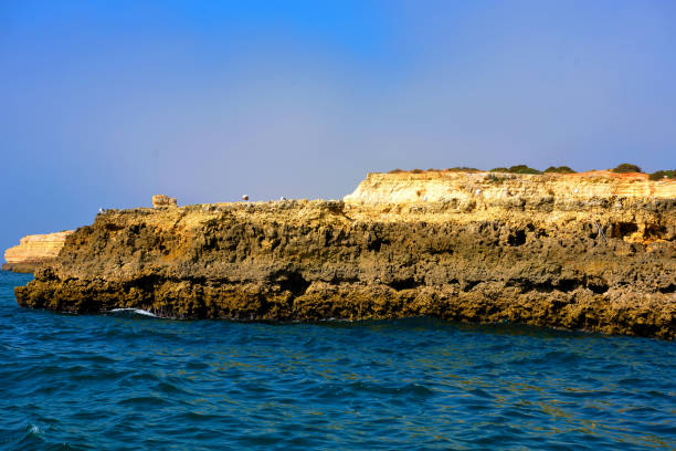 The Algarve Rocks Formation is a unique and stunning natural wonder located in the coastal town of Porches Portugal