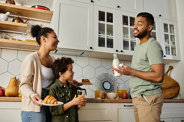 istock Delightful moments shared by a loving family in their cozy kitchen 2199123792