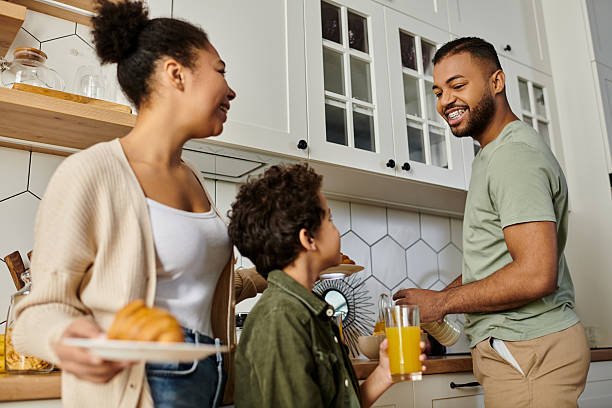 istock Loving family enjoying breakfast together in a warm kitchen filled with laughter and joy 2199123793