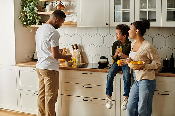 istock Joyful family bonding time in the kitchen creating healthy snacks together 2199124060