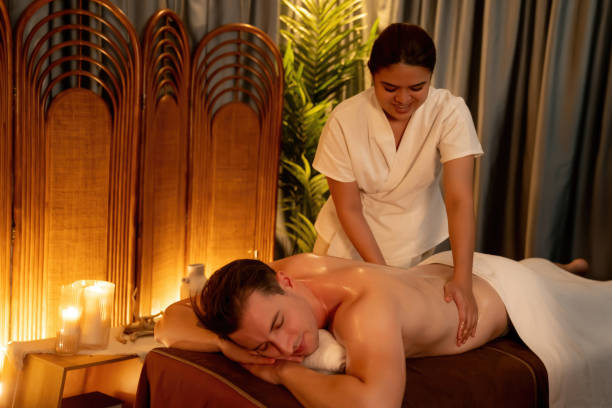 istock Caucasian man customer enjoying relaxing anti-stress massage. Quiescent 2199129191
