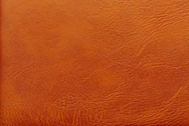 istock Macro synthetic leather surface,Vector seamless texture of basketball ball. Realistic pattern of synthetic leather with chaotic dots. Orange sports background. Square empty surface with repeating bumps. 2199129586