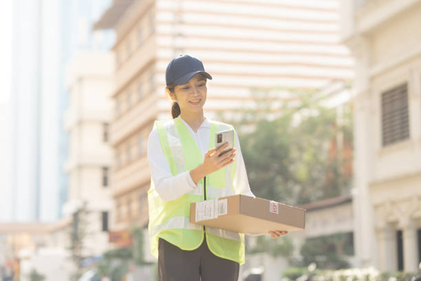 istock Asian female worker express delivery service 2199130197