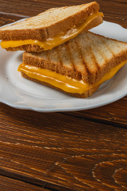 istock Delicious grilled cheese sandwich served on a white plate 2199132492