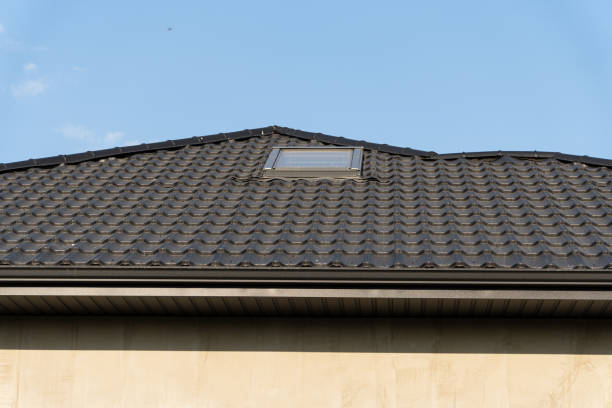 istock A residential building with a distinct rooftop design hosts a skylight, illuminated by the bright blue sky above 2199132636