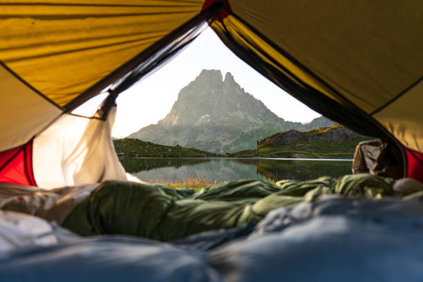 istock Pico D’Ayous seen from inside a tent facing a lake 2199132894