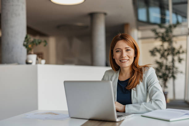 istock Businesswoman Working on a Laptop 2199133433