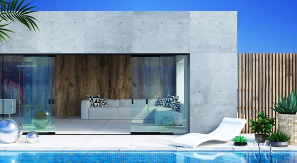 istock Sea Concrete modern villa with pool and sunbeds 2199133568