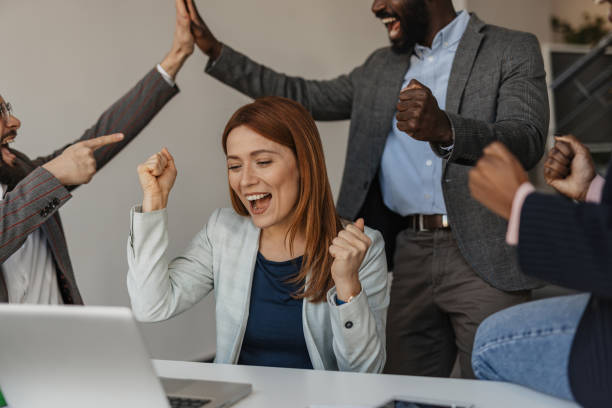 istock Excited Team Celebrating a Workplace Achievement 2199133744