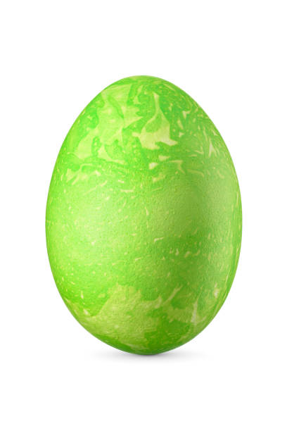 istock Green decorative Easter egg with yellow stains isolated on a white. 2199135581