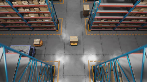 istock Warehouse Facility: Unmanned AGV Robots Delivering Cardboard Boxes, Parcels 2199136393