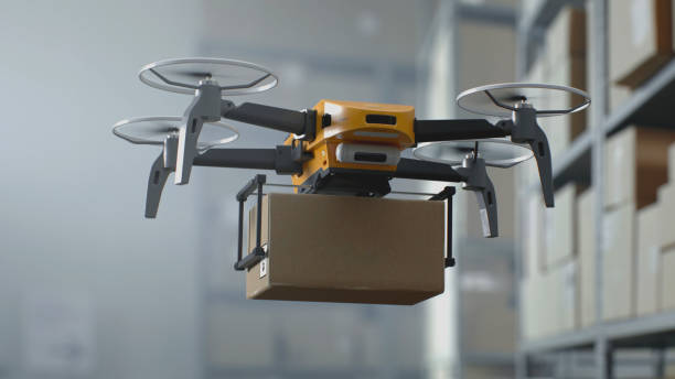 istock Modern Warehouse Facility: Aerial AGV Drone Delivering Cardboard Box 2199136635