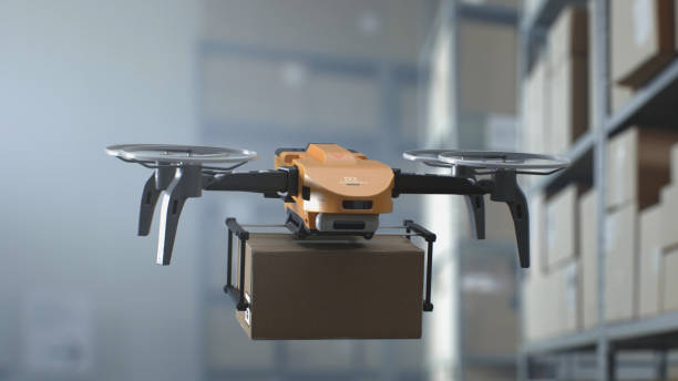 istock Logistics Distribution Center: UAV Drone Carrying and Delivering Cardboard Package 2199136775