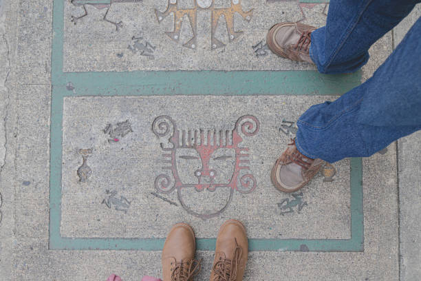 istock Feet Over Indigenous-Inspired Sidewalk Art 2199137627