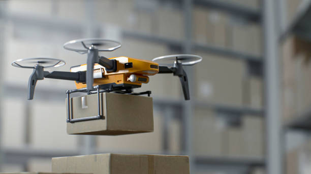 istock Logistics Distribution Center: UAV Drone Carrying and Delivering Cardboard Package 2199139239