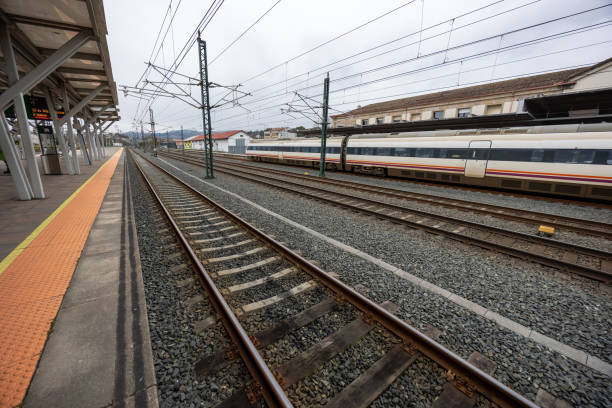 istock High-Speed Train at Railway Station Platform Scene 2199140035
