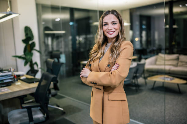 istock Young blonde businesswoman posing confidently in a professional setting 2199140124