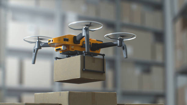 istock Modern Warehouse Facility: Unmanned UAV Drone Delivering Cardboard Box with Goods 2199140489