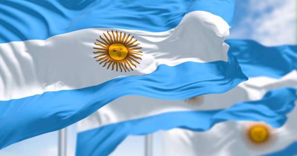 istock Argentina national flags waving on a clear day 2199144052