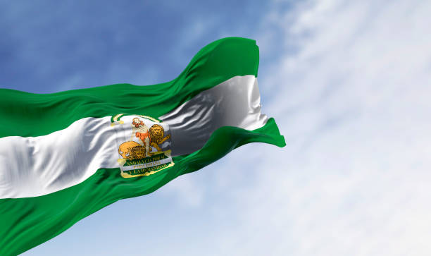 istock Andalusia flag waving in the wind 2199144054