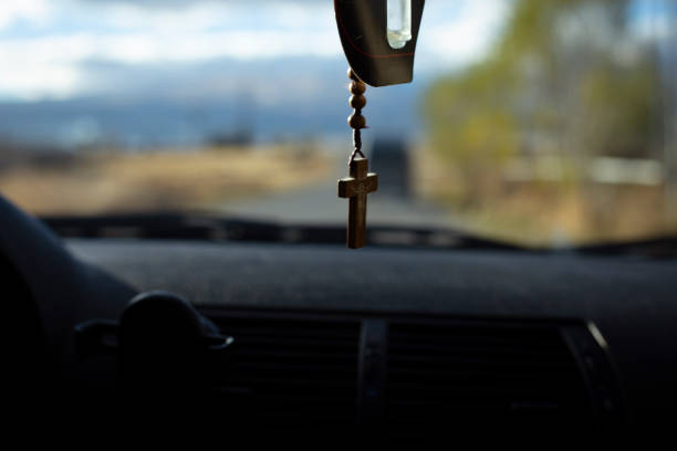 istock Christian cross in the car 2199146086