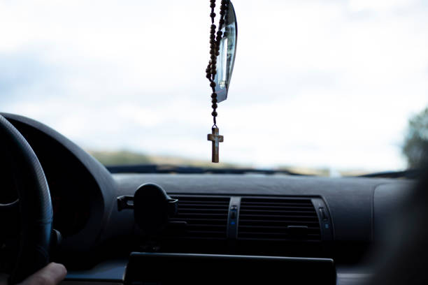 istock Christian cross in the car 2199146101