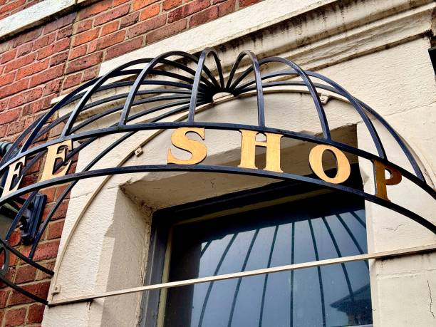 istock A retro style coffee shop entrance with reflections in a window 2199147940