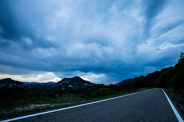 Sunset and dramatic clouds in La Garrotxa, Spain.