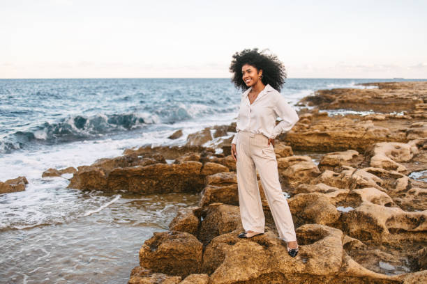 istock African woman posing by the sea 2199148549