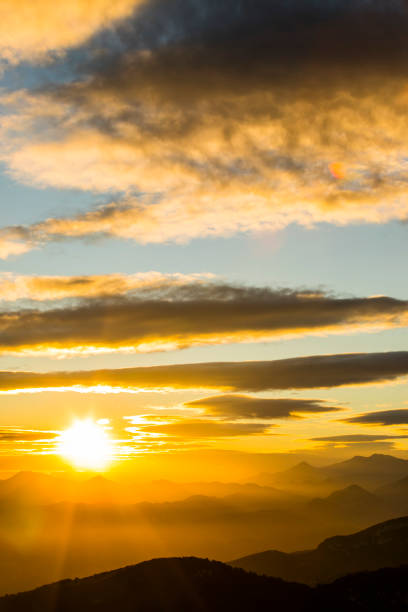 istock Sunset and wind clouds in La Garrotxa, Girona, Spain 2199149404