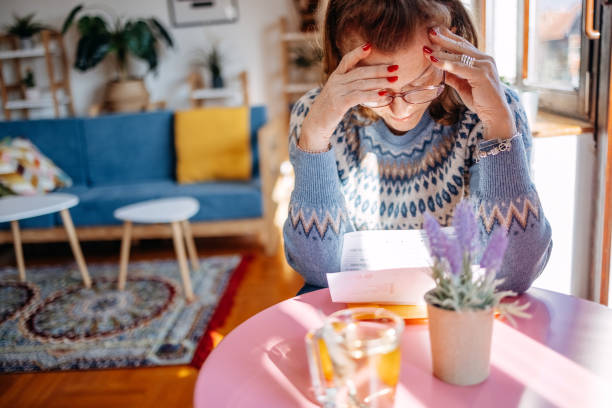 istock Mature adults spending time enjoying alone at home and going through home finances 2199149454