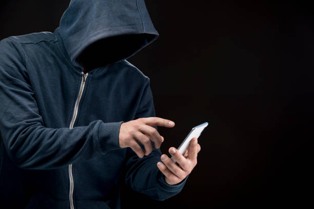 istock clicks on the phone screen on a dark background. 2199154944