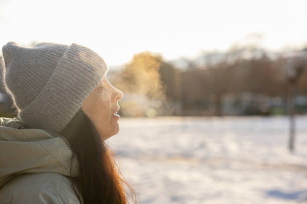 istock Steam coming out when breathing in the winter 2199157505