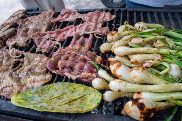 istock Barbecue grilling beef, and cactus for a flavorful outdoor meal experience 2199157856