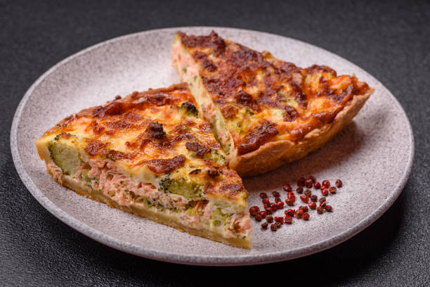 istock Delicious fresh quiche with broccoli, cheese, spices and herbs 2199160579