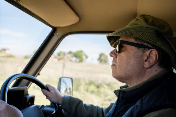 istock Man in the back of a 4x4 2199163891
