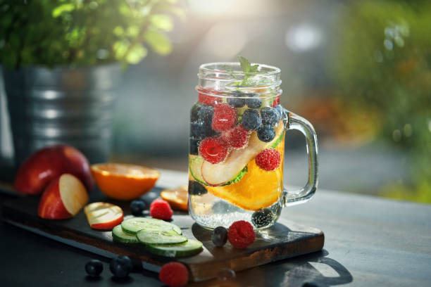istock Summer Cup Mocktail with Orange, Lime, Berries, Peach and Cucumber 2199164657