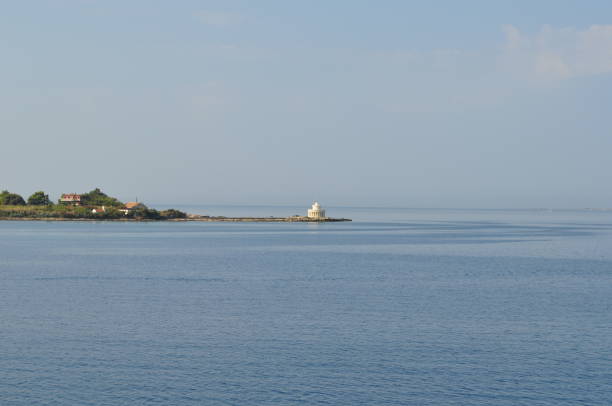 Small picturesque lighthouse on the island in the Adriatic Sea.