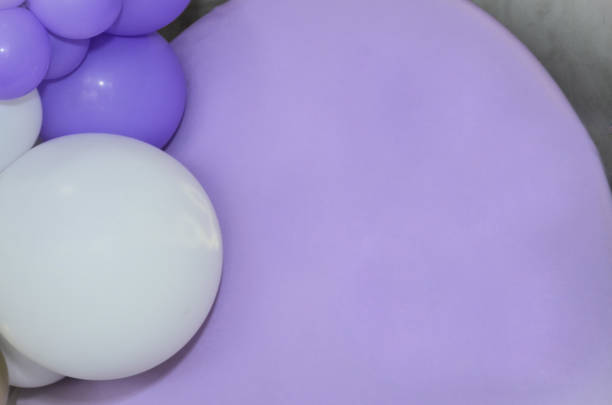 istock Party panel with purple and white balloons 2199166645
