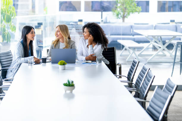 istock Three women meeting in a board room. 2199172280