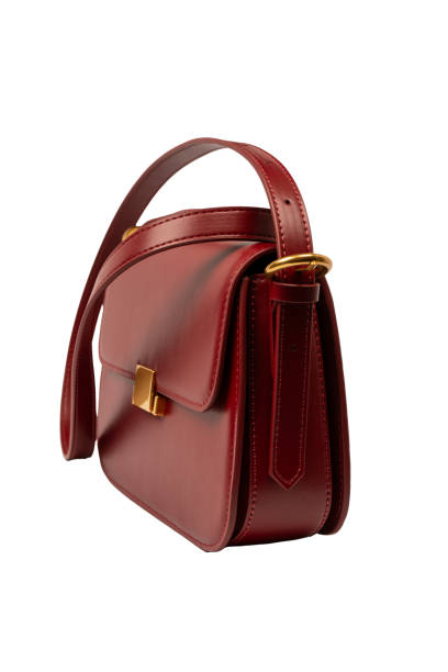 istock Burgundy shoulder leather bag isolated on white background. 2199172447