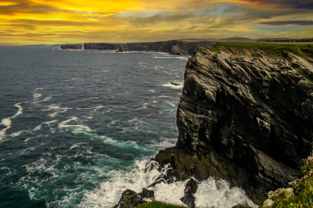 istock Sunrise Over the Cliffs on Dingle Peninsula in Ireland 2199175899