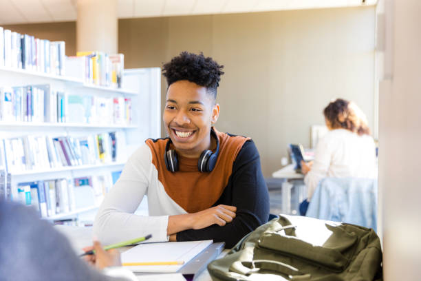 istock Happy Male University Student Studying in Library 2199176504